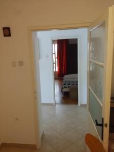 Posteľ alebo postele v izbe v ubytovaní Apartments Katarina