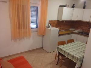 Kuchyňa alebo kuchynka v ubytovaní Apartments Katarina