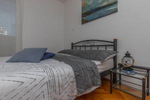 Postel nebo postele na pokoji v ubytování Apartment Svorcan