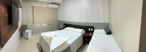 TV a/nebo společenská místnost v ubytování Hotel Royal SG