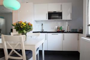 Kuchyňa alebo kuchynka v ubytovaní 4 Seasons Zandvoort