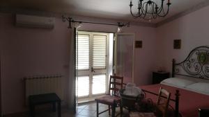 Postel nebo postele na pokoji v ubytování Cinisi 89 B&B