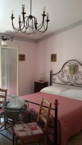 Postel nebo postele na pokoji v ubytování Cinisi 89 B&B