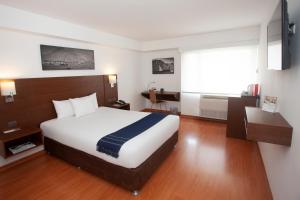 Postel nebo postele na pokoji v ubytování Casa Andina Select Miraflores