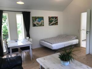 A bed or beds in a room at Charm Inn