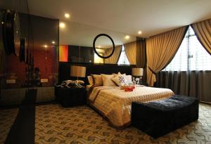 Voodi või voodid majutusasutuse Hermess Hotel Johor toas