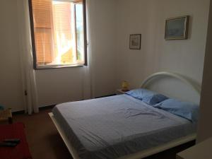 Ένα ή περισσότερα κρεβάτια σε δωμάτιο στο In campagna al mare