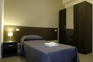 A bed or beds in a room at B&B Grandangolo