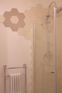 Et badeværelse på Porta San Biagio Rooms + 63 billeder