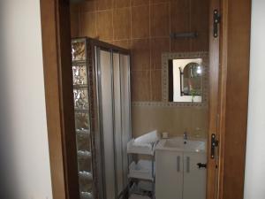 Koupelna v ubytování Hostal El Canario + 37 fotografií