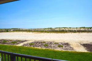 a view of the beach from a balcony at Breakaway East 109 in Ocean City