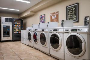 a row of washers and dryers in a store at Grand Legacy At The Park in Anaheim