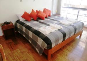 Postel nebo postele na pokoji v ubytování Real House Cusco