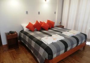 Postel nebo postele na pokoji v ubytování Real House Cusco