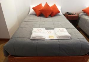 Postel nebo postele na pokoji v ubytování Real House Cusco