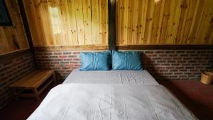 Postel nebo postele na pokoji v ubytování Joy House Sapa