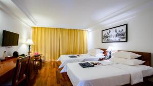 Televízia a/alebo spoločenská miestnosť v ubytovaní Hotel Somadevi Angkor Resort & Spa