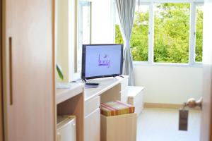 TV a/nebo společenská místnost v ubytování Trang Hotel Bangkok - SHA Plus