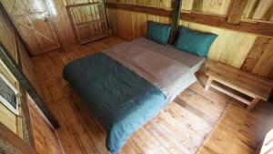 Postel nebo postele na pokoji v ubytování Joy House Sapa