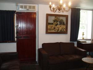 A seating area at The Old Forge Seafood Restaurant and Bed and Breakfast 