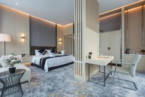 Voodi või voodid majutusasutuse Chongqing Liyuan Hotel toas