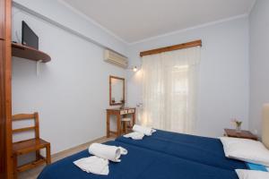 Postel nebo postele na pokoji v ubytování Villa Phoenix