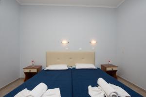 Postel nebo postele na pokoji v ubytování Villa Phoenix