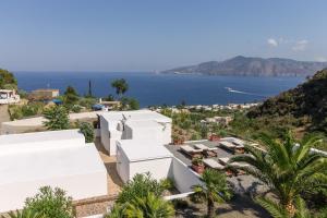 an image of a house with a view of the ocean at B&B Sunrise in Santa Marina Salina