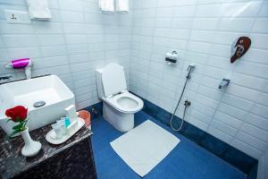 Baðherbergi á Hotel Task International