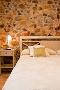 Кровать или кровати в номере Posada El Nozal