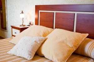 Postel nebo postele na pokoji v ubytování Posada El Nozal