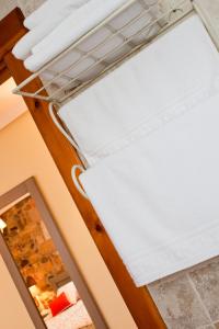 Postel nebo postele na pokoji v ubytování Posada El Nozal