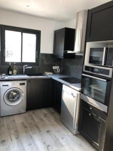 Kuchyň nebo kuchyňský kout v ubytování Residence Mare e Monte