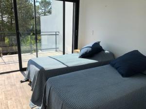 Tempat tidur dalam kamar di Residence Mare e Monte