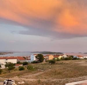 a view of a town with a cloudy sky at Panorama in Vodice