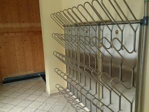a wall of wine racks in a wine cellar at Appartement Hochleitner in Wagrain +14 photos