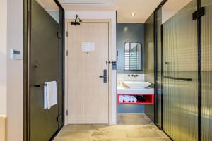 Ліжко або ліжка в номері PACE HOTEL Suzhou Guanqian Branch