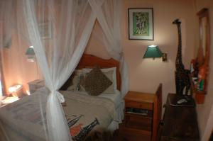 Letto o letti in una camera di Trees Too Guest Lodge