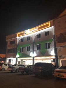 a building with a painting on the side of it at K VILA HOTEL in Sungai Petani