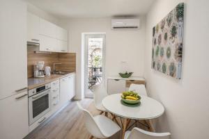 Η κουζίνα ή μικρή κουζίνα στο Apartment Dioclessima