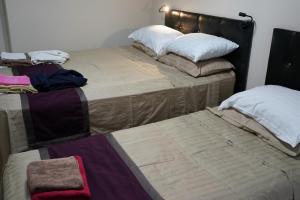 Letto o letti in una camera di Ponto Hotel