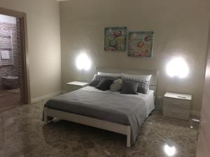 Postel nebo postele na pokoji v ubytování B&B Amores