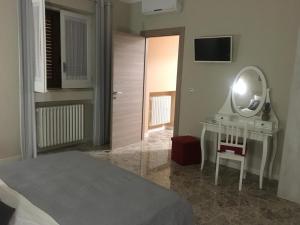 TV a/nebo společenská místnost v ubytování B&B Amores