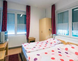 Letto o letti in una camera di Balaton Vendégház Fonyód