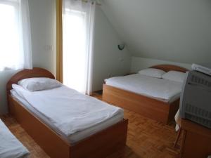 Voodi või voodid majutusasutuse Rooms Hochkraut toas +20 fotot
