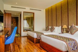 Katil atau katil-katil dalam bilik di Dong Duong Hotel & Suites - Afternoon Tea Inclusive - Very Central