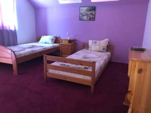 Postel nebo postele na pokoji v ubytování Guesthouse Flora
