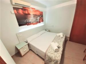 Posteľ alebo postele v izbe v ubytovaní Hostal Kokkola