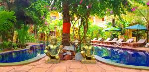 Bazén v ubytování Le Jardin d'Angkor Hotel & Resort nebo v jeho okolí