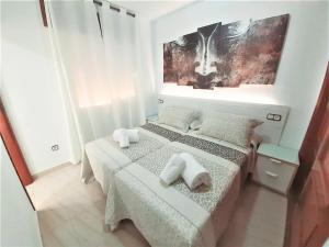 Posteľ alebo postele v izbe v ubytovaní Hostal Kokkola
